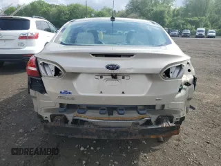 2017 Ford Focus SE z VIN 1FADP3F2XHL335127, wystawiony jako Copart lot #56119005 z przebiegiem 58 272 mil mil oraz Szkoda całkowita • Salvage title. Historia ofert i sprzedaży dostępna na DreamBid. Obrazek 6.