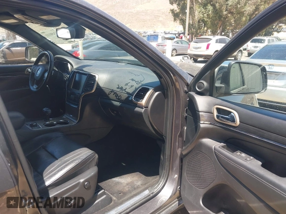 2015 Jeep Grand Cherokee Overland with VIN 1C4RJFCG7FC839778, listed as a IAAI auction lot 42490111 with 160,040 mi miles and . Bid and sale history available at DreamBid. Image 5.