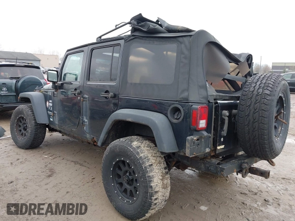 2008 Jeep Wrangler Unlimited X with VIN 1J4GA39138L641138, listed as a IAAI auction lot 41986230 with 215,026 mi miles. Bid and sale history available at carsss.com. Image 3.