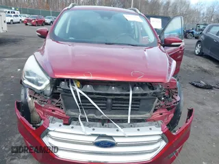 2017 Ford Escape Titanium with VIN 1FMCU0JD9HUC71738, listed as a IAAI auction lot 41673228 with 173,615 mi miles. Bid and sale history available at carsss.com. Image 6.