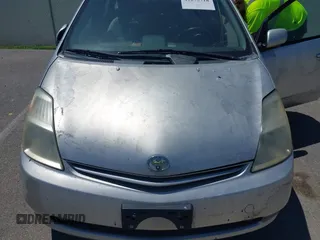 2005 Toyota Prius z VIN JTDKB20U657012346, wystawiony jako IAAI lot #42275718 z przebiegiem 180 851 mil mil oraz . Historia ofert i sprzedaży dostępna na DreamBid. Obrazek 6.