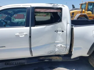2021 Toyota Tacoma SR5 with VIN 3TMDZ5BN5MM118710, listed as a IAAI auction lot 42460278 with 60,310 mi miles and . Bid and sale history available at DreamBid. Image 18.