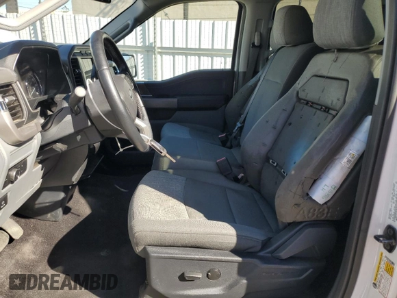 2022 Ford F-150 XL with VIN 1FTEW1EB9NKE67725, listed as a Copart auction lot 82253604 with 14,760 mi miles and Salvage Title. Bid and sale history available at carsss.com. Image 7.