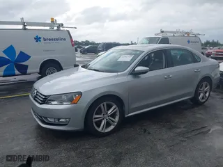 2013 Volkswagen Passat SEL Premium with VIN 1VWCM7A30DC001492, listed as a IAAI auction lot 41981749 with 1 mi miles. Bid and sale history available at carsss.com. Image 2.