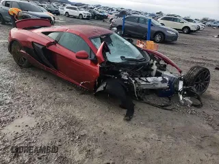 2015 McLaren 650S z VIN SBM11DAA8FW004651, wystawiony jako Copart lot #84895284 z przebiegiem Nie podano mil oraz Szkody całkowita. Historia ofert i sprzedaży dostępna na DreamBid. Obrazek 11.