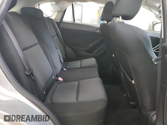 2013 Mazda CX-5 Sport with VIN JM3KE2BE6D0110272, listed as a Copart auction lot 57570725 with 124,475 mi miles and Salvage title. Bid and sale history available at DreamBid. Image 11.