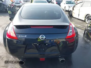 2014 Nissan 370Z Touring with VIN JN1AZ4EH1EM631097, listed as a IAAI auction lot 41230197 with 85,304 mi miles. Bid and sale history available at carsss.com. Image 16.