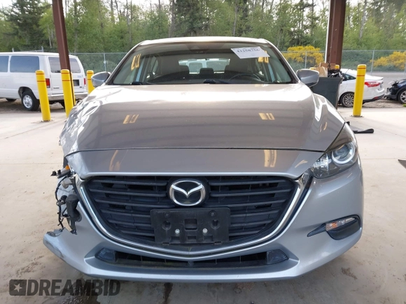 2018 Mazda 3 Touring z VIN 3MZBN1L37JM201797, wystawiony jako IAAI lot #42258756 z przebiegiem 80 593 mil mil oraz . Historia ofert i sprzedaży dostępna na DreamBid. Obrazek 12.