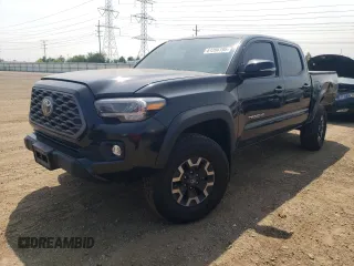 2021 Toyota Tacoma SR with VIN 3TMCZ5AN5MM417465, listed as a Copart auction lot 61266195 with 59,078 mi miles and Salvage title. Bid and sale history available at DreamBid. Image 1.