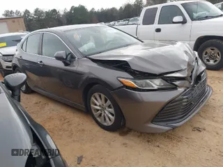 2019 Toyota Camry LE z VIN 4T1B11HK9KU716033, wystawiony jako IAAI lot #41762866 z przebiegiem 149 987 mil mil oraz . Historia ofert i sprzedaży dostępna na DreamBid. Obrazek 1.