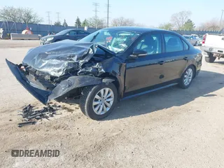 2012 Volkswagen Passat S with VIN 1VWAP7A39CC023813, listed as a IAAI auction lot 42007470 with 165,737 mi miles and . Bid and sale history available at DreamBid. Image 2.