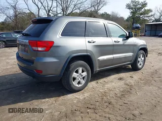 2013 Jeep Grand Cherokee Laredo with VIN 1C4RJEAG0DC616413, listed as a IAAI auction lot 41345278 with 157,875 mi miles. Bid and sale history available at carsss.com. Image 4.
