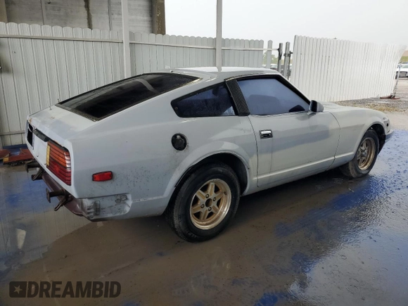 1982 Datsun 280ZX z VIN JN1HZ04S5CX431646, wystawiony jako Copart lot #55607255 z przebiegiem 173 546 mil mil oraz Tytuł czysty. Historia ofert i sprzedaży dostępna na DreamBid. Obrazek 3.
