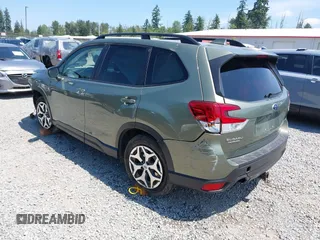 2021 Subaru Forester Premium with VIN JF2SKAFC5MH550118, listed as a IAAI auction lot 42427536 with 31,469 mi miles and . Bid and sale history available at DreamBid. Image 3.