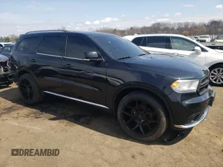 2016 Dodge Durango Limited with VIN 1C4RDJDG9GC485319, listed as a Copart auction lot 52536295 with 127,541 mi miles and Salvage Title. Bid and sale history available at DreamBid. Image 4.