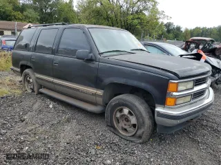 1999 Chevrolet Tahoe Z71 with VIN 1GNEK13R3XJ458174, listed as a Copart auction lot 70461674 with 181,622 mi miles and Salvage Title. Bid and sale history available at carsss.com. Image 4.