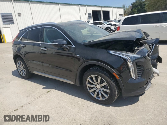 2021 Cadillac XT4 FWD Premium Luxury z VIN 1GYFZCR48MF002468, wystawiony jako Copart lot #50878955 z przebiegiem 76 034 mil mil oraz Szkoda całkowita • Salvage title. Historia ofert i sprzedaży dostępna na DreamBid. Obrazek 4.