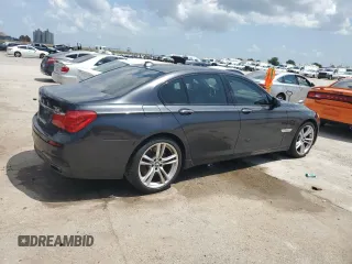 2011 BMW 7 Series 750i with VIN WBAKA8C59BCY36657, listed as a Copart auction lot 61484925 with 174,605 mi miles and Salvage title. Bid and sale history available at DreamBid. Image 3.