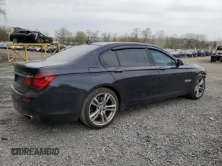 2014 BMW 7 Series ALPINA B7 xDrive with VIN WBAYF8C51ED652985, listed as a Copart auction lot 54299625 with 80,577 mi miles and Salvage Title. Bid and sale history available at DreamBid. Image 3.