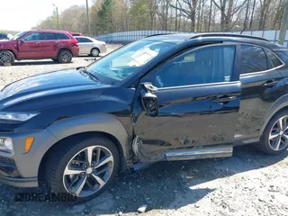2018 Hyundai Kona Ultimate with VIN KM8K53A58JU123279, listed as a IAAI auction lot 41898010 with 60,002 mi miles. Bid and sale history available at carsss.com. Image 6.
