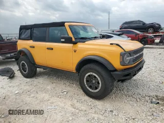 2021 Ford Bronco with VIN 1FMEE5DP9MLA93791, listed as a Copart auction lot 49489765 with 58,427 mi miles and Salvage title. Bid and sale history available at DreamBid. Image 4.