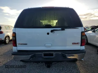 2005 GMC Yukon SLE with VIN 1GKEC13T25J237118, listed as a Copart auction lot 73771344 with 0 mi miles and Non Repairable. Bid and sale history available at carsss.com. Image 6.