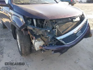 2012 Kia Sorento LX with VIN 5XYKTCA61CG221464, listed as a IAAI auction lot 41762388 with 155,076 mi miles. Bid and sale history available at carsss.com. Image 6.