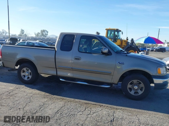 2002 Ford F-150 XL with VIN 1FTRX17232NA79508, listed as a IAAI auction lot 41870844 with 111,429 mi miles. Bid and sale history available at carsss.com. Image 13.