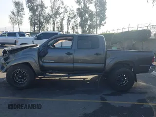 2013 Toyota Tacoma PreRunner z VIN 5TFJU4GN1DX046628, wystawiony jako IAAI lot #41216083 z przebiegiem Nie podano mil oraz . Historia ofert i sprzedaży dostępna na DreamBid. Obrazek 15.
