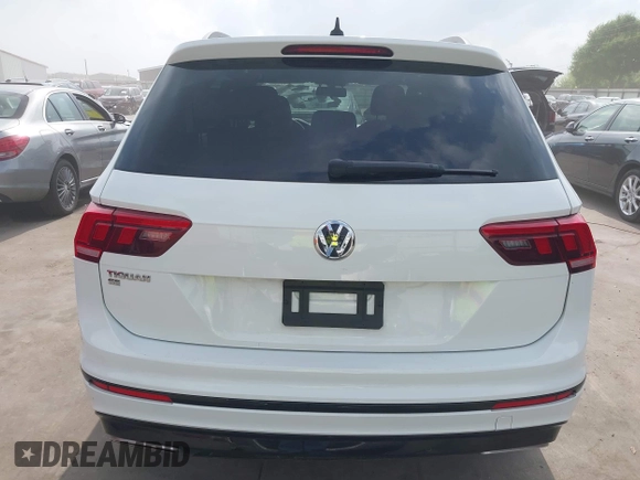 2021 Volkswagen Tiguan SE with VIN 3VV3B7AX9MM003432, listed as a IAAI auction lot 41914477 with 64,530 mi miles and . Bid and sale history available at DreamBid. Image 17.