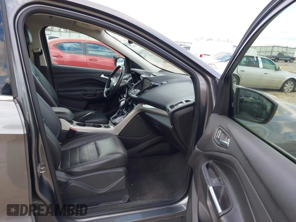 2013 Ford Escape SEL with VIN 1FMCU0HX8DUD68360, listed as a IAAI auction lot 41427968 with 129,067 mi miles. Bid and sale history available at carsss.com. Image 5.