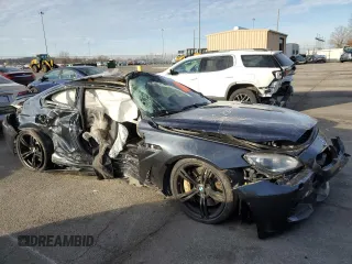 2015 BMW M6 z VIN WBSLX9C52FD160752, wystawiony jako Copart lot #83657994 z przebiegiem Nie podano mil oraz Czysty tytuł • Clean title. Historia ofert i sprzedaży dostępna na DreamBid. Obrazek 4.