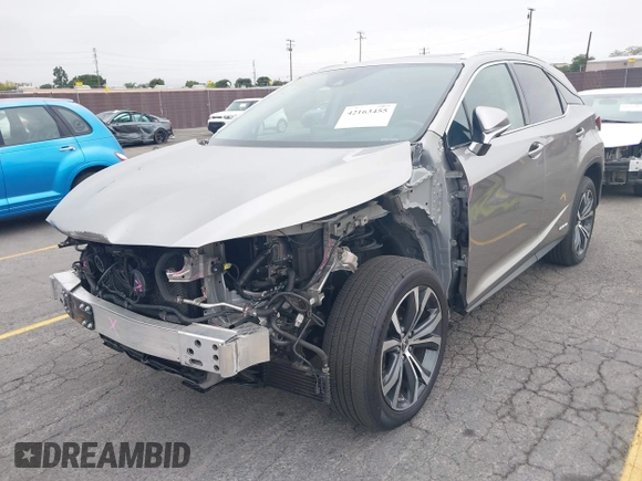 2021 Lexus RX 450h with VIN 2T2HGMDA3MC060208, listed as a IAAI auction lot 42163455 with 34,167 mi miles and . Bid and sale history available at DreamBid. Image 18.