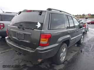 2004 Jeep Grand Cherokee Limited with VIN 1J4GW58N34C399673, listed as a IAAI auction lot 41976505 with 194,005 mi miles. Bid and sale history available at carsss.com. Image 4.