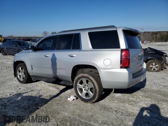 2015 Chevrolet Tahoe LT with VIN 1GNSCBKC5FR292582, listed as a Copart auction lot 42202885 with 152,388 mi miles and Salvage Title. Bid and sale history available at DreamBid. Image 2.