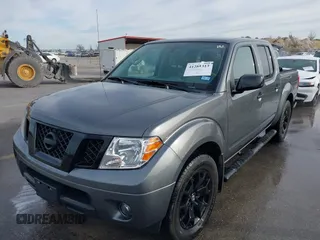 2021 Nissan Frontier SV with VIN 1N6ED0EA6MN722476, listed as a IAAI auction lot 41284313 with 22,476 mi miles and . Bid and sale history available at DreamBid. Image 2.