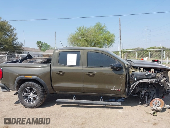 2023 GMC Canyon 4WD AT4 with VIN 1GTP6DEK5P1231432, listed as a IAAI auction lot 41785102 with 33,154 mi miles and . Bid and sale history available at carsss.com. Image 14.