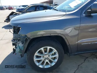 2015 Jeep Grand Cherokee Altitude with VIN 1C4RJEAG0FC952260, listed as a IAAI auction lot 41738692 with 124,197 mi miles. Bid and sale history available at carsss.com. Image 19.