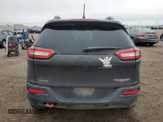 2015 Jeep Cherokee Trailhawk with VIN 1C4PJMBB6FW574108, listed as a Copart auction lot 57798475 with 105,022 mi miles and Salvage title. Bid and sale history available at DreamBid. Image 6.
