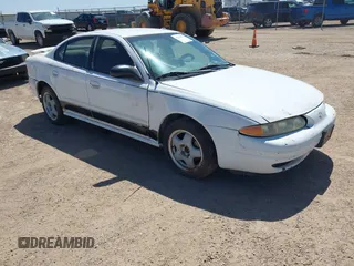 2004 Oldsmobile Alero GL1 z VIN 1G3NL52E24C192576, wystawiony jako IAAI lot #42279477 z przebiegiem 207 050 mil mil oraz . Historia ofert i sprzedaży dostępna na DreamBid. Obrazek 1.