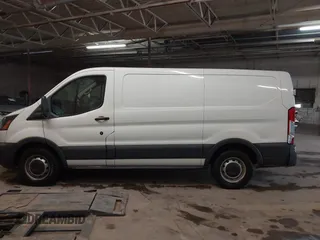 2018 Ford Transit with VIN 1FTYE1ZM2JKB30853, listed as a IAAI auction lot 42025674 with 188,545 mi miles and . Bid and sale history available at DreamBid. Image 14.