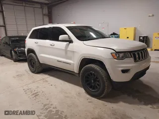 2018 Jeep Grand Cherokee Laredo E with VIN 1C4RJFAG0JC105804, listed as a IAAI auction lot 41587036 with 107,601 mi miles. Bid and sale history available at carsss.com. Image 1.