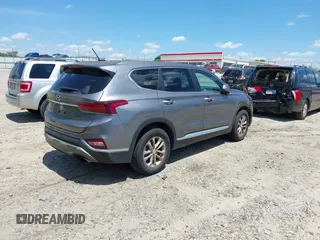 2019 Hyundai Santa Fe SE with VIN 5NMS23AD3KH083786, listed as a IAAI auction lot 42196828 with Not Provided miles and . Bid and sale history available at DreamBid. Image 4.