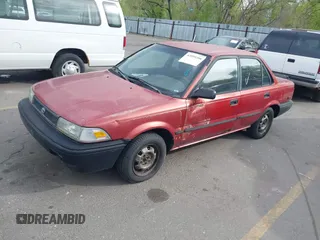 1991 Toyota Corolla z VIN 1NXAE94AXMZ209706, wystawiony jako IAAI lot #42099208 z przebiegiem 192 222 mil mil oraz . Historia ofert i sprzedaży dostępna na DreamBid. Obrazek 2.