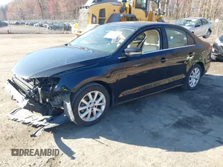 2013 Volkswagen Jetta Sedan SE w/Convenience/Sunroof with VIN 3VWDX7AJ9DM424595, listed as a IAAI auction lot 41807615 with 102,971 mi miles. Bid and sale history available at carsss.com. Image 2.