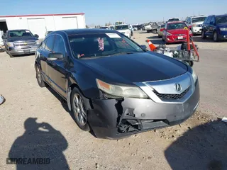 2009 Acura TL Tech with VIN 19UUA86559A013240, listed as a IAAI auction lot 41970519 with 221,815 mi miles. Bid and sale history available at carsss.com. Image 1.