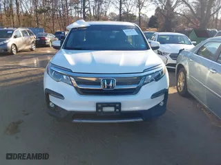 2022 Honda Pilot EX-L with VIN 5FNYF6H54NB084899, listed as a IAAI auction lot 41524725 with 35,827 mi miles. Bid and sale history available at carsss.com. Image 12.