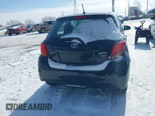 2015 Toyota Yaris L with VIN VNKJTUD34FA055116, listed as a IAAI auction lot 41601874 with 84,508 mi miles. Bid and sale history available at carsss.com. Image 16.