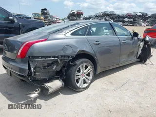 2019 Jaguar XJ Portfolio with VIN SAJWA2G75K8W19401, listed as a IAAI auction lot 42214533 with 64,909 mi miles and . Bid and sale history available at DreamBid. Image 4.