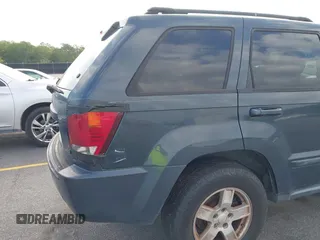 2007 Jeep Grand Cherokee Laredo with VIN 1J8GS48K17C684497, listed as a IAAI auction lot 42136314 with 155,024 mi miles. Bid and sale history available at carsss.com. Image 15.